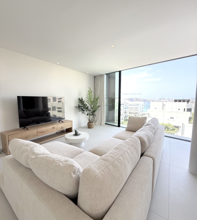Resa Estates Ibiza longterm rent Talamanca penthouse living tv .jpeg